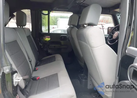 2009 Jeep Wrangler Unlimited X из США, поврежденный, VIN 1J4GA39119L752174